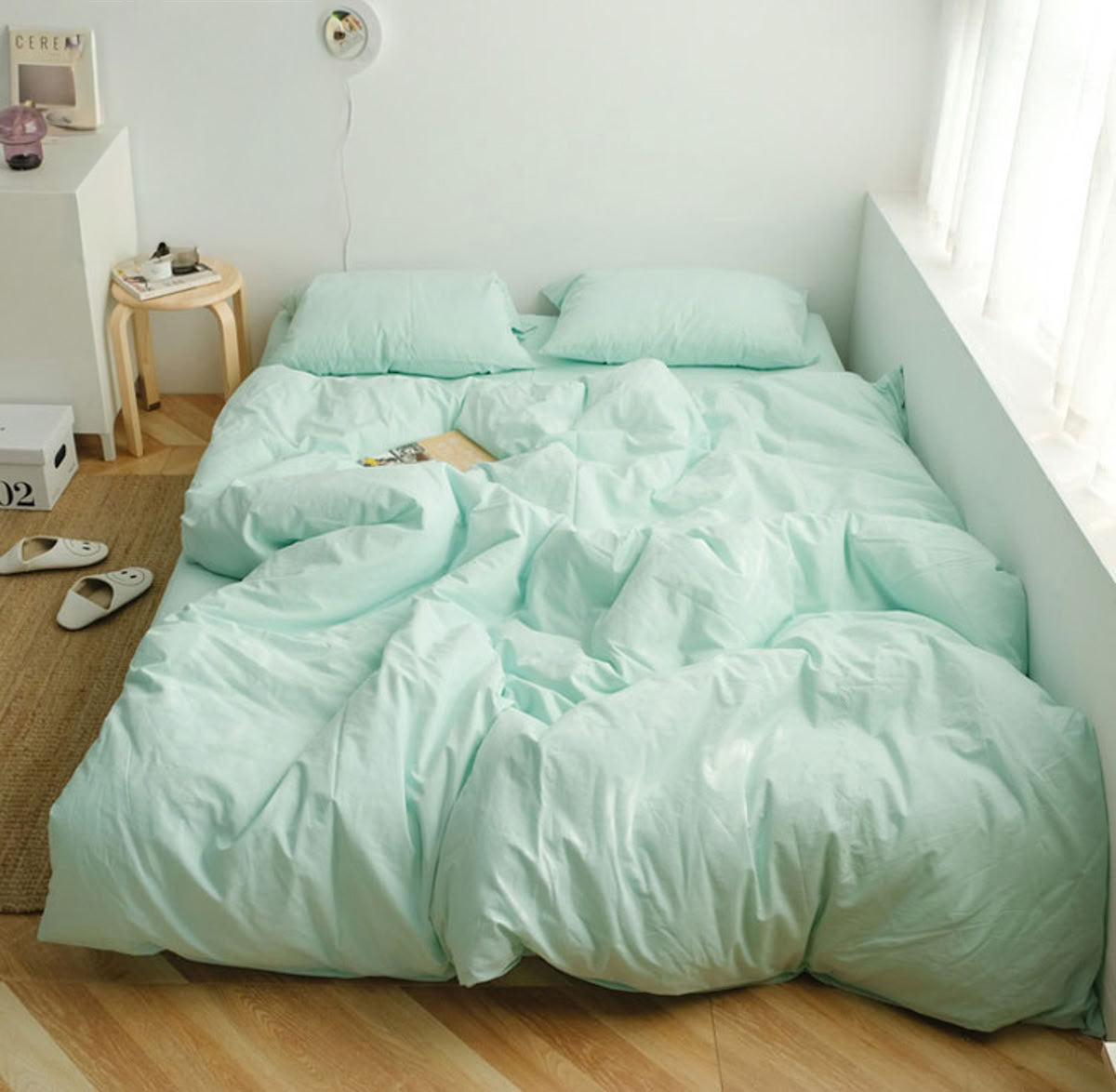Calm Mint Green washed cotton bedding set creating a soothing earthy bedroom look - RoomDen  