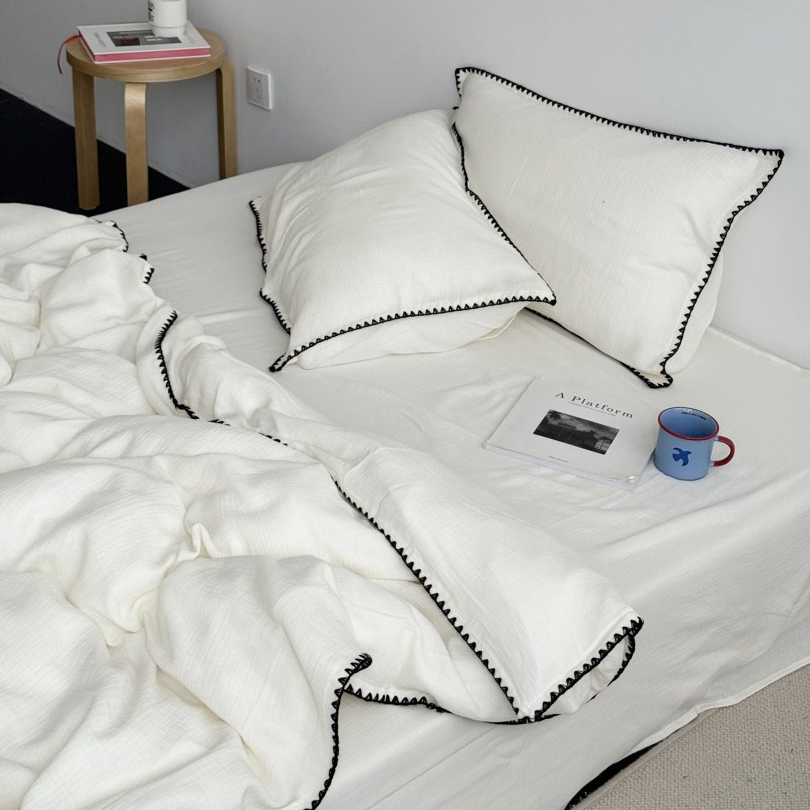 Side view of bedding set showing duvet thickness and texture | RoomDen