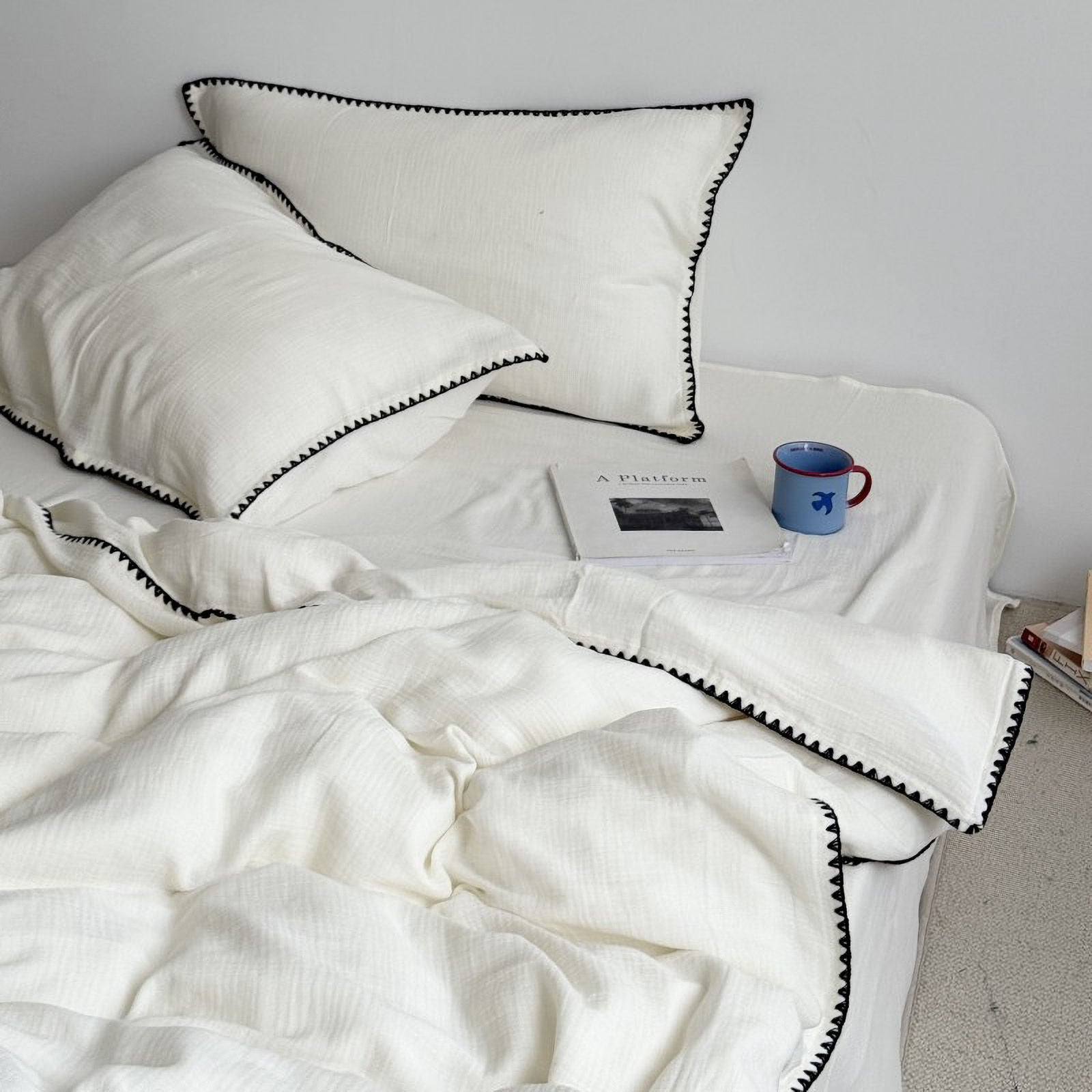 Minimalist bedding set styling with pillows and duvet cover | RoomDen