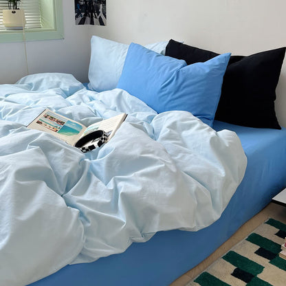 Sky blue duvet with mid-blue sheet contrast bedding in minimalist style – RoomDen