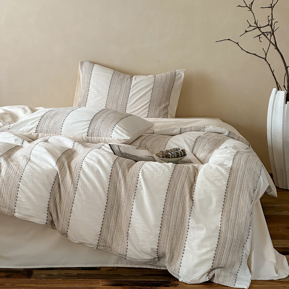 Solmere Striped Waffle-Weave Cotton Bedding Set – ivory stripe front view of the striped bedding and pillows - Roomden