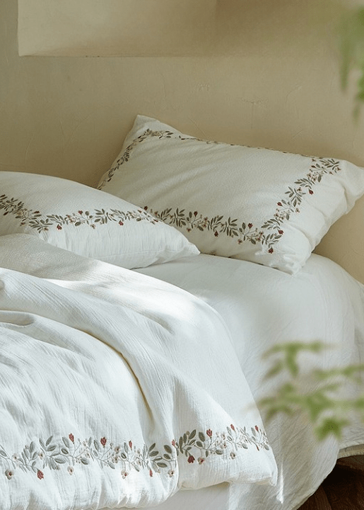 Botanical vine embroidery on ivory cotton gauze bedding - Roomden